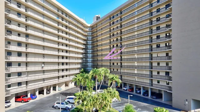 a view of a balcony with chairs
