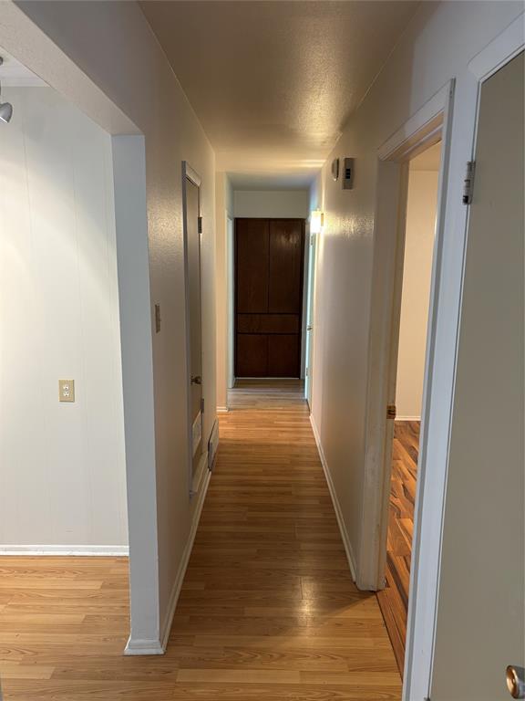 2708 Runningbrook Lane Dallas, TX 75228 - Photo 8 of 23 hallway to bedrooms