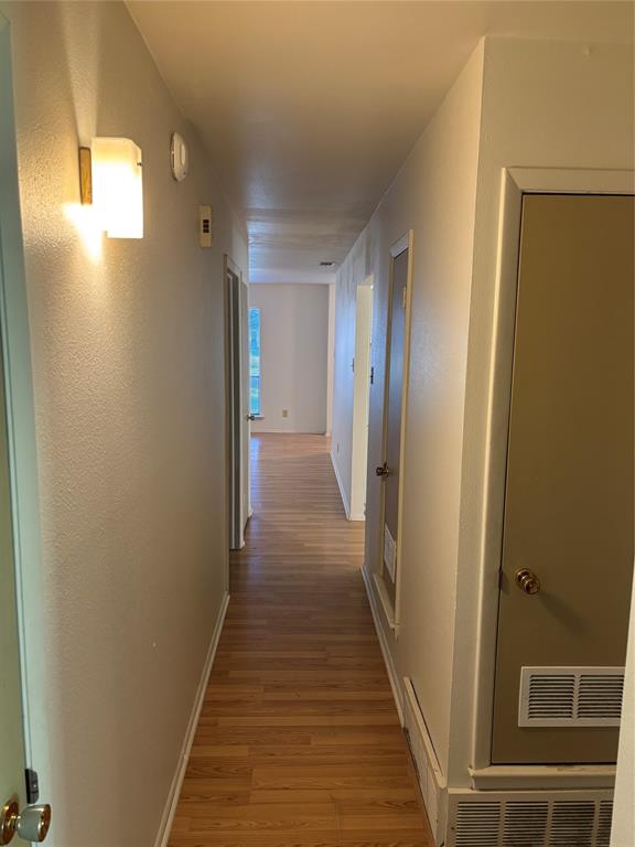 2708 Runningbrook Lane Dallas, TX 75228 - Photo 9 of 23 hallway to second living