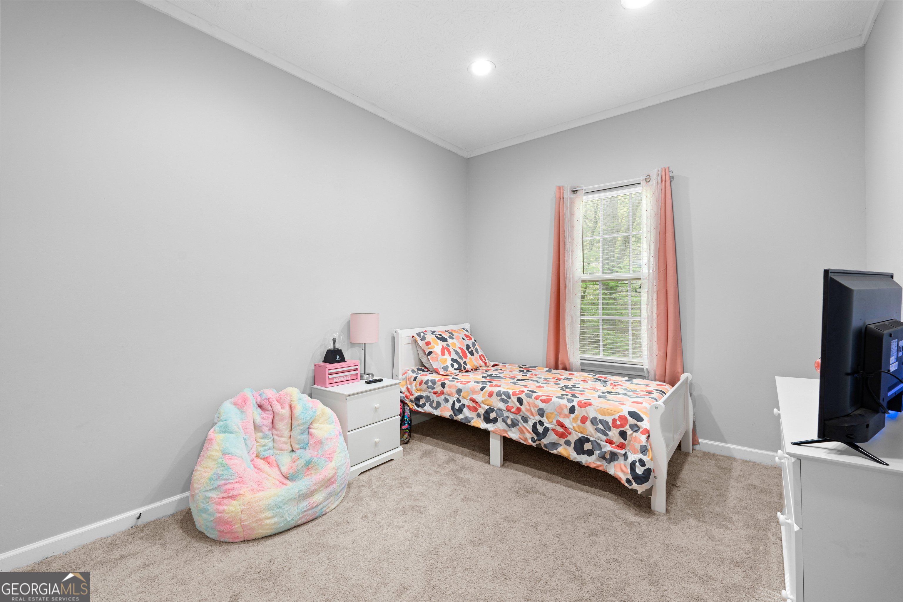 35 South Robin Lane Newnan, GA 30263 - Photo 27 of 50 a bedroom with a bed and a window