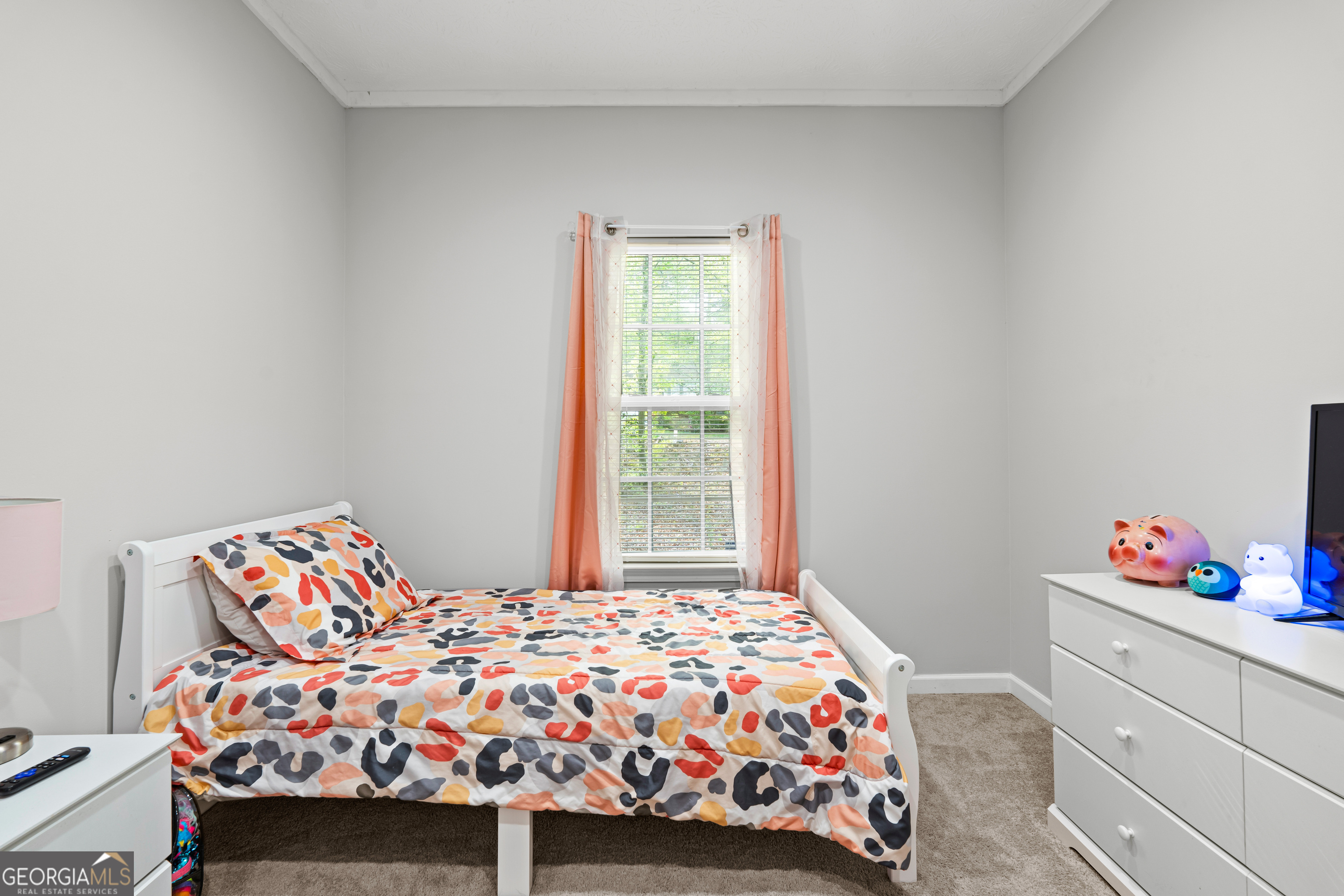 35 South Robin Lane Newnan, GA 30263 - Photo 28 of 50 a bedroom with a bed and a window