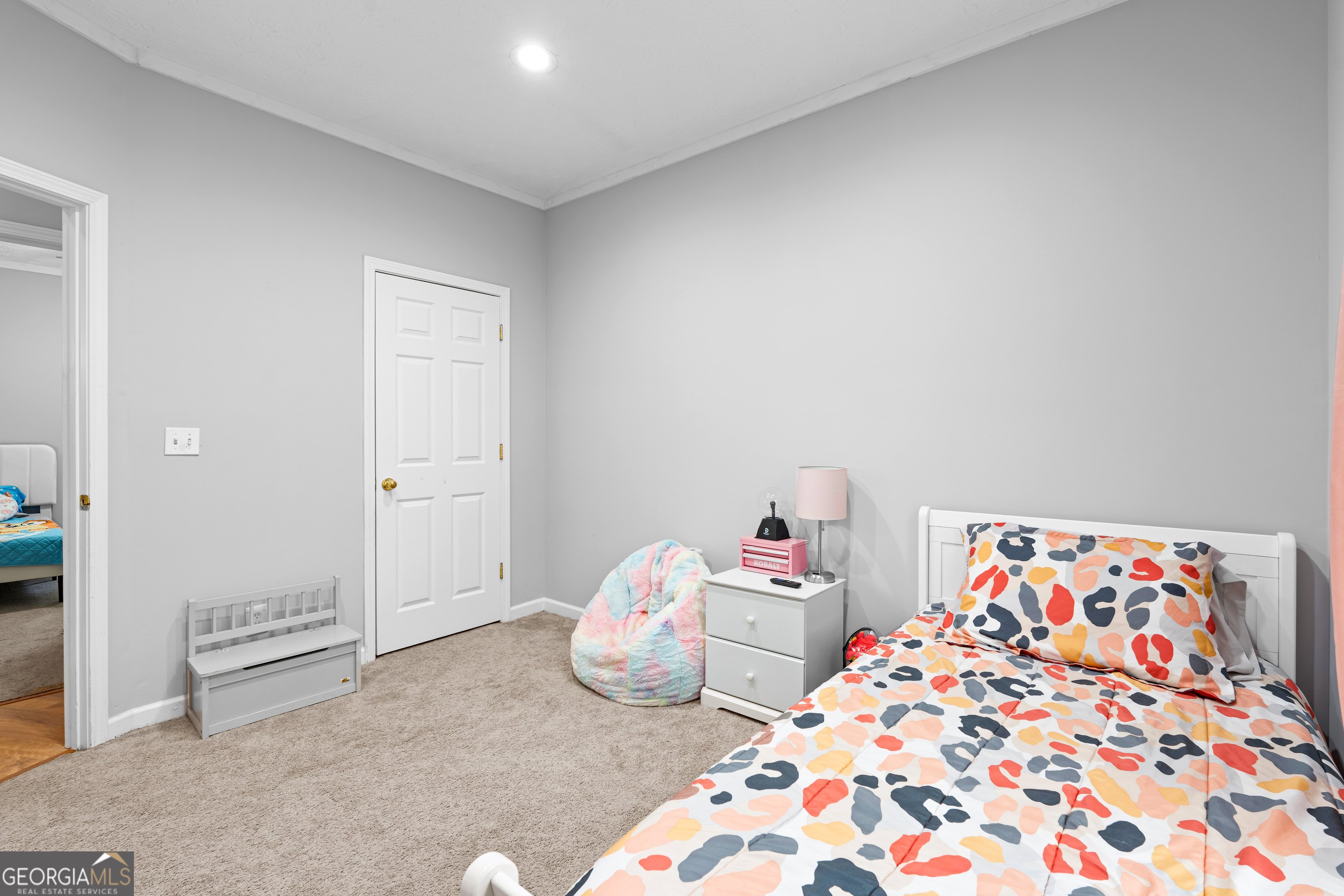 35 South Robin Lane Newnan, GA 30263 - Photo 29 of 50 a bedroom with two beds and a painting on the wall