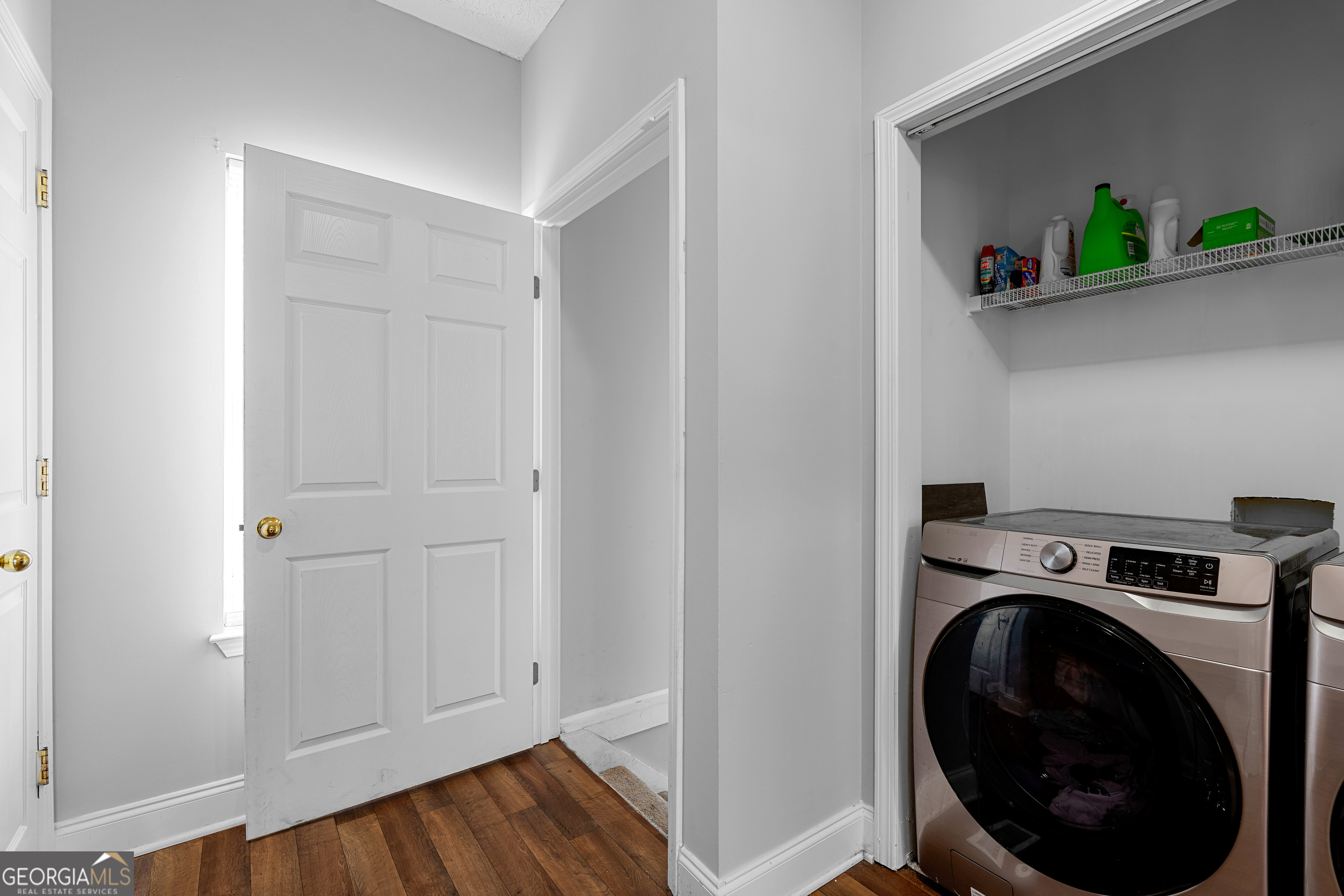 35 South Robin Lane Newnan, GA 30263 - Photo 32 of 50 a utility room with dryer and washer