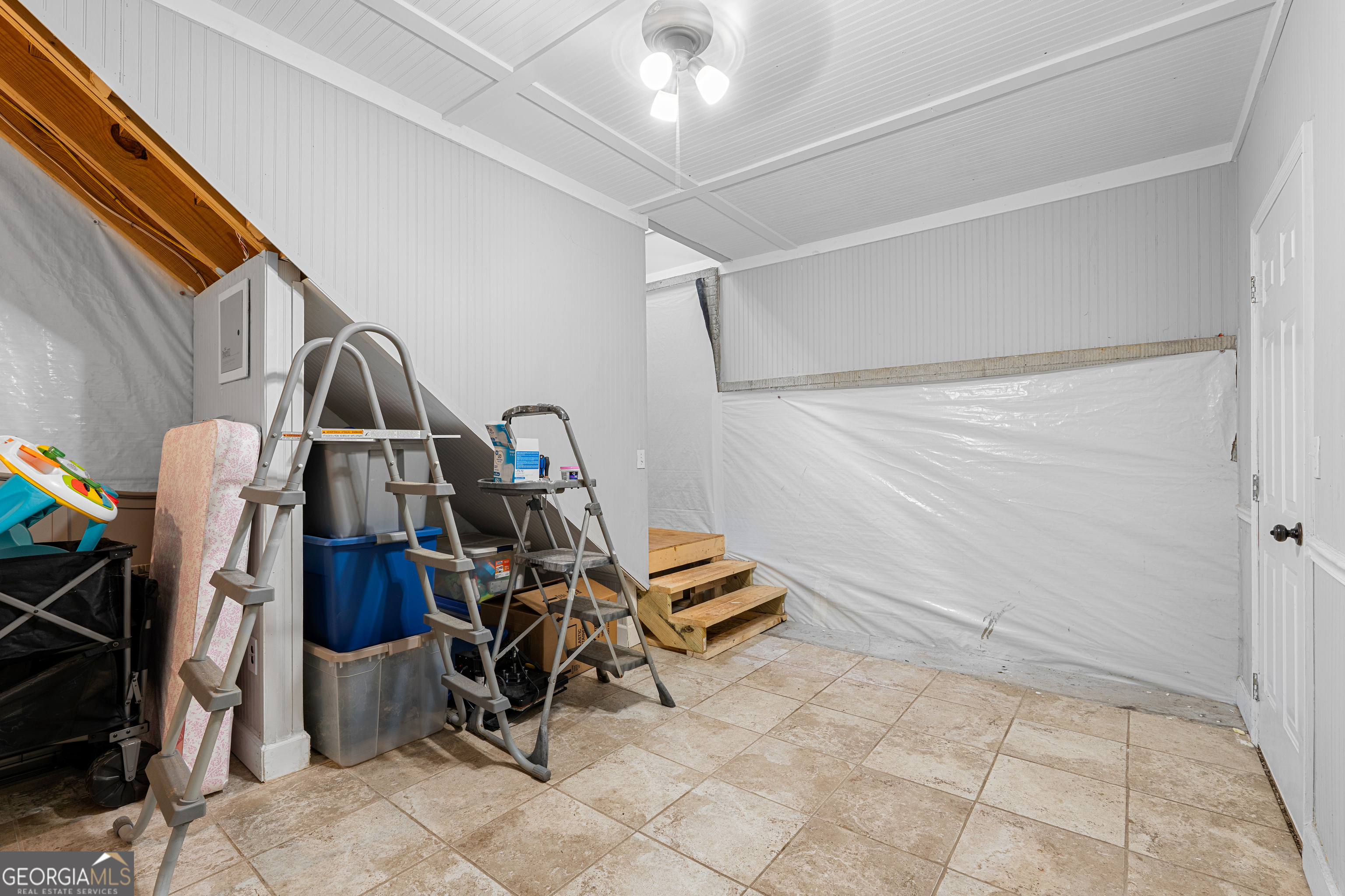 35 South Robin Lane Newnan, GA 30263 - Photo 33 of 50 a view of a room with gym equipment