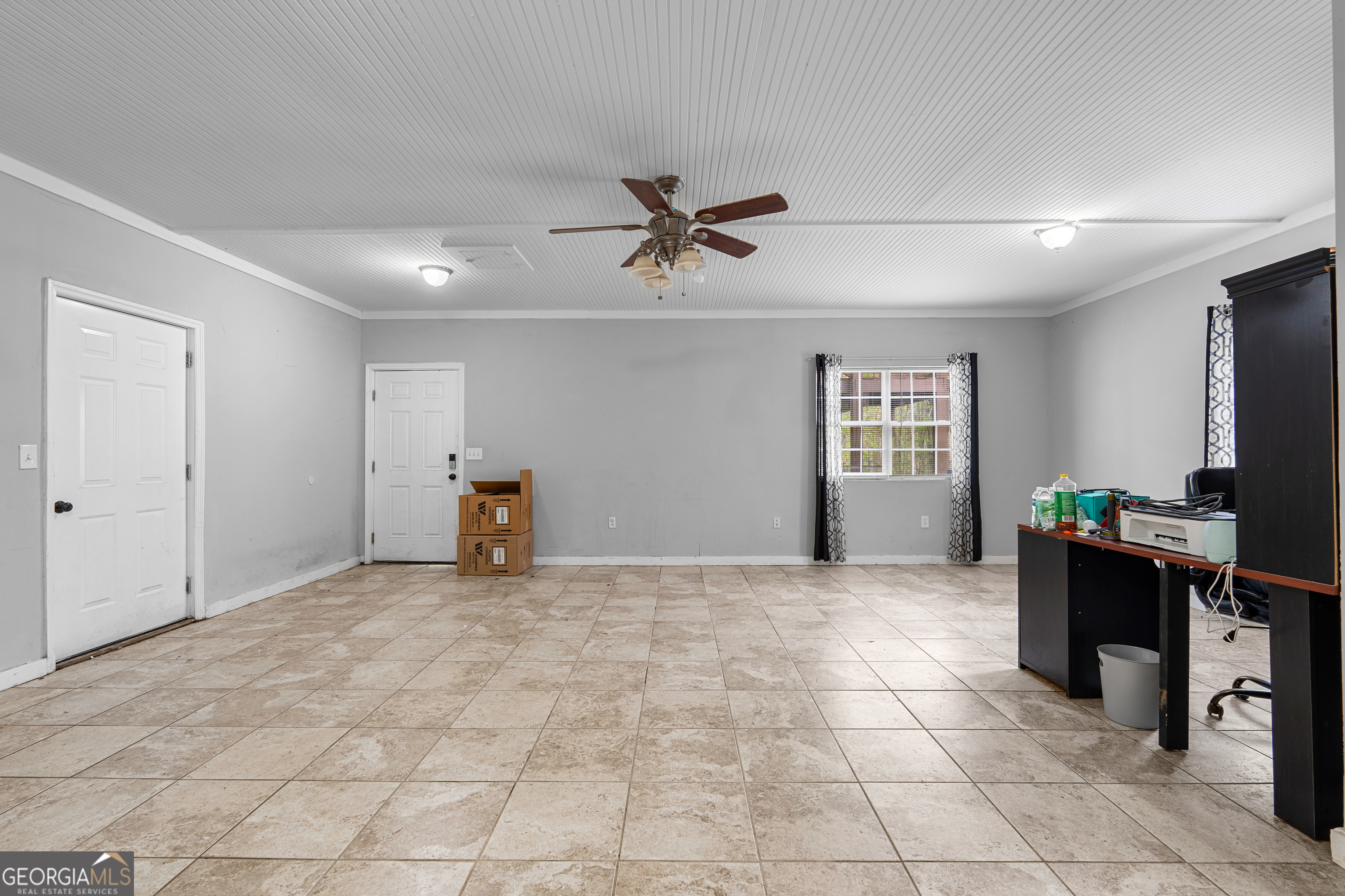 35 South Robin Lane Newnan, GA 30263 - Photo 37 of 50 a view of a livingroom with workspace and a window