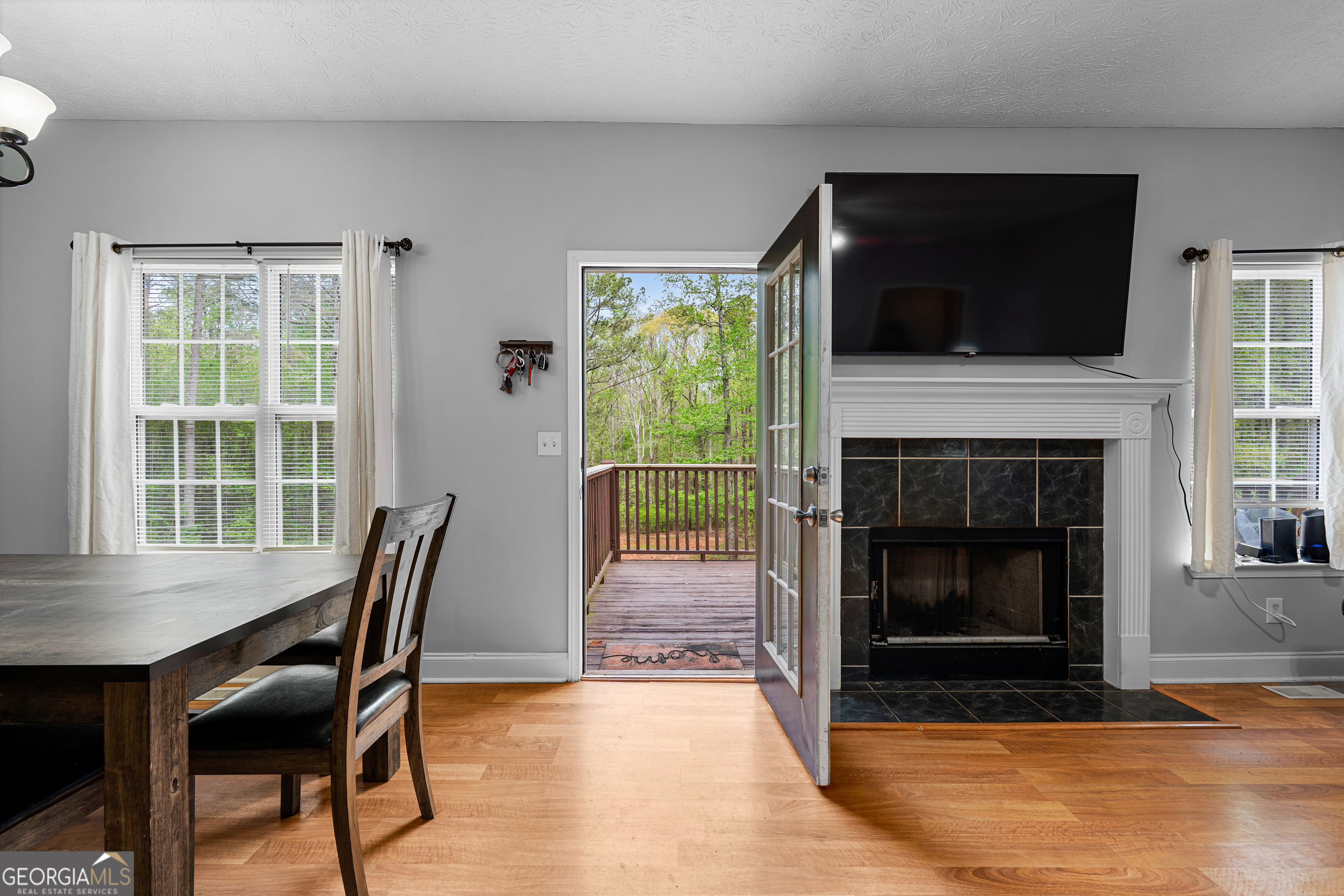 35 South Robin Lane Newnan, GA 30263 - Photo 40 of 50 a dining room with furniture and fireplace