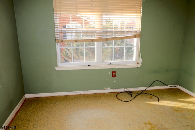 12 Rutgers Drive, Unit 12 Newark, NJ 07103 - Photo 18 of 22 a bathroom with a granite countertop window and a sink