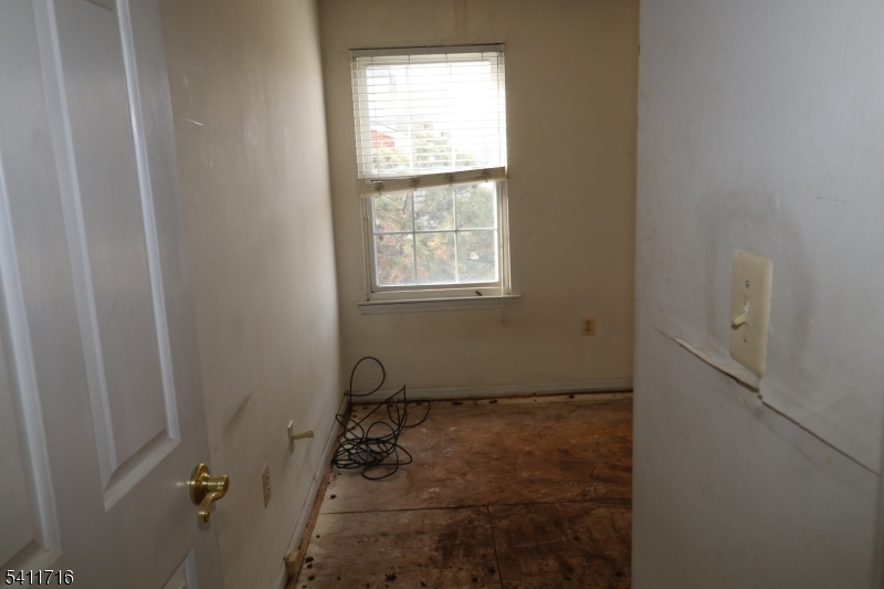 12 Rutgers Drive, Unit 12 Newark, NJ 07103 - Photo 21 of 22 a bathroom with a window sink and shower