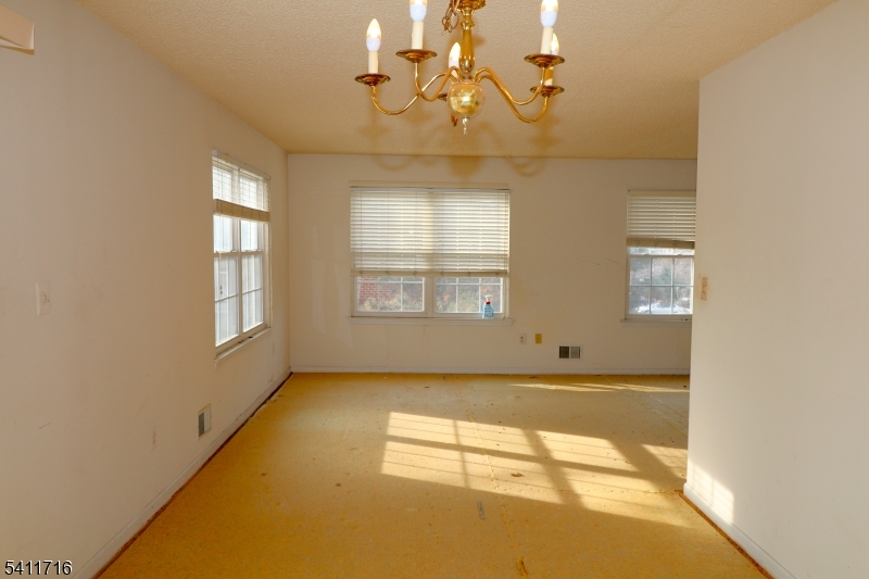 12 Rutgers Drive, Unit 12 Newark, NJ 07103 - Photo 5 of 22 a view of an empty room and window