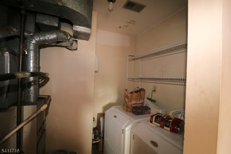 12 Rutgers Drive, Unit 12 Newark, NJ 07103 - Photo 8 of 22 a room with storage and utility