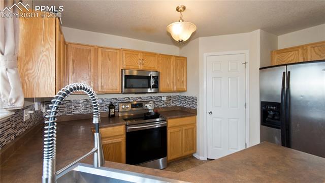 7063 Red Cardinal Loop Colorado Springs, CO 80908 - Photo 12 of 36 Gallery Image 12