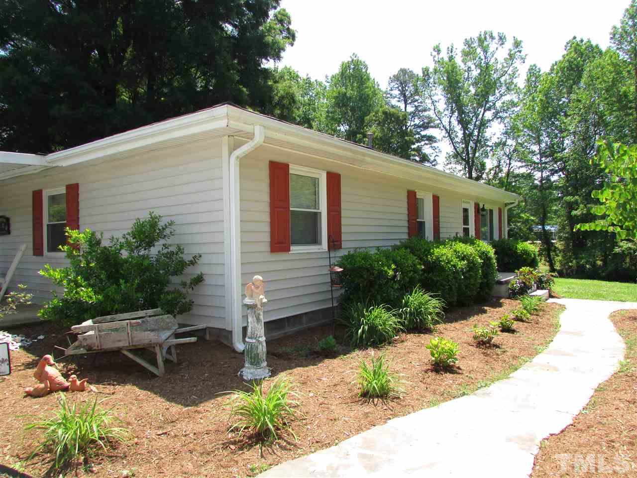 1231 Chambers Loop Road Timberlake, NC 27583 - Photo 1 of 22 What a doll house. Don't miss out on this sweet cottage