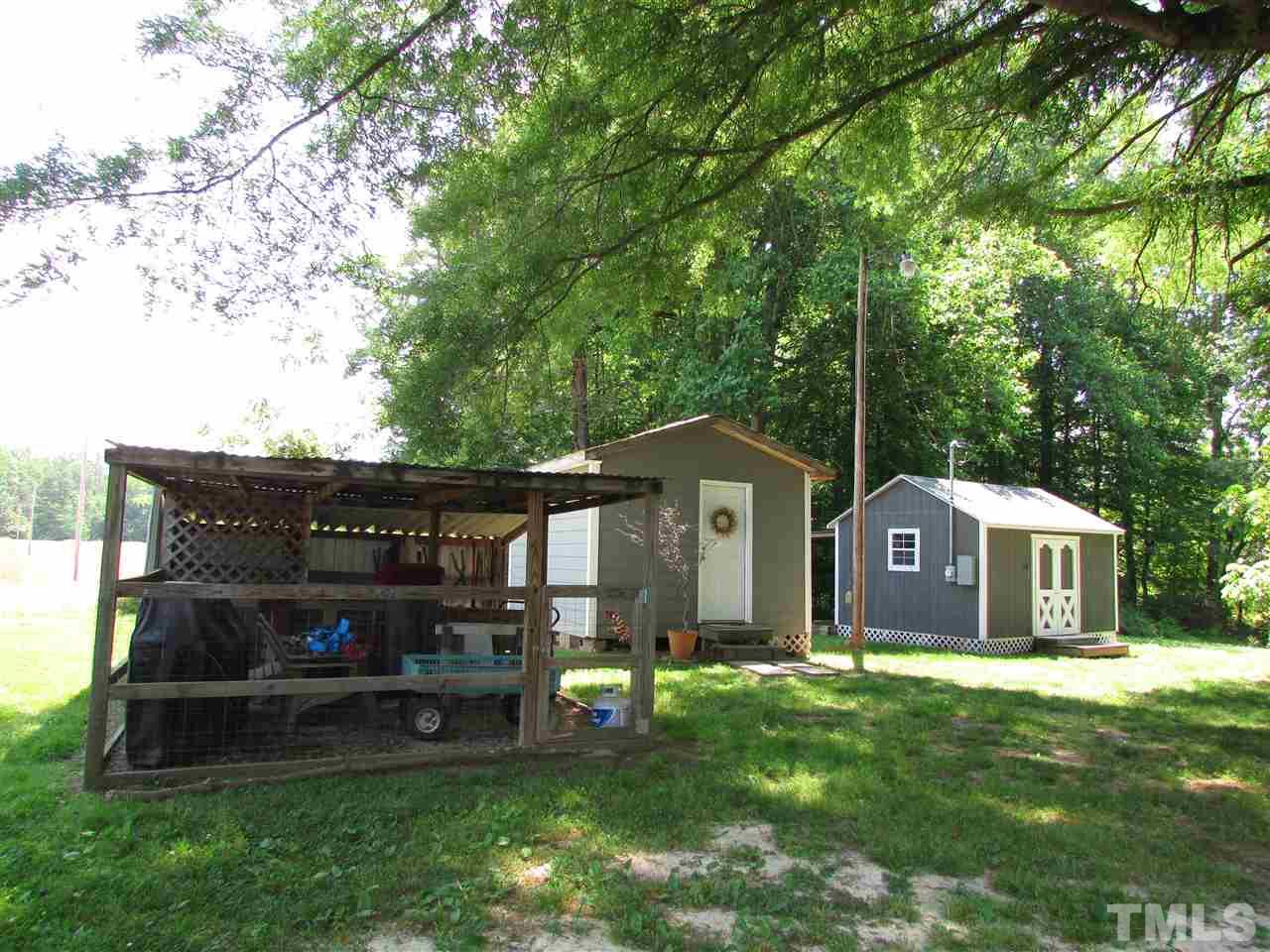 1231 Chambers Loop Road Timberlake, NC 27583 - Photo 15 of 22 There are several out buildings some even with shed storage