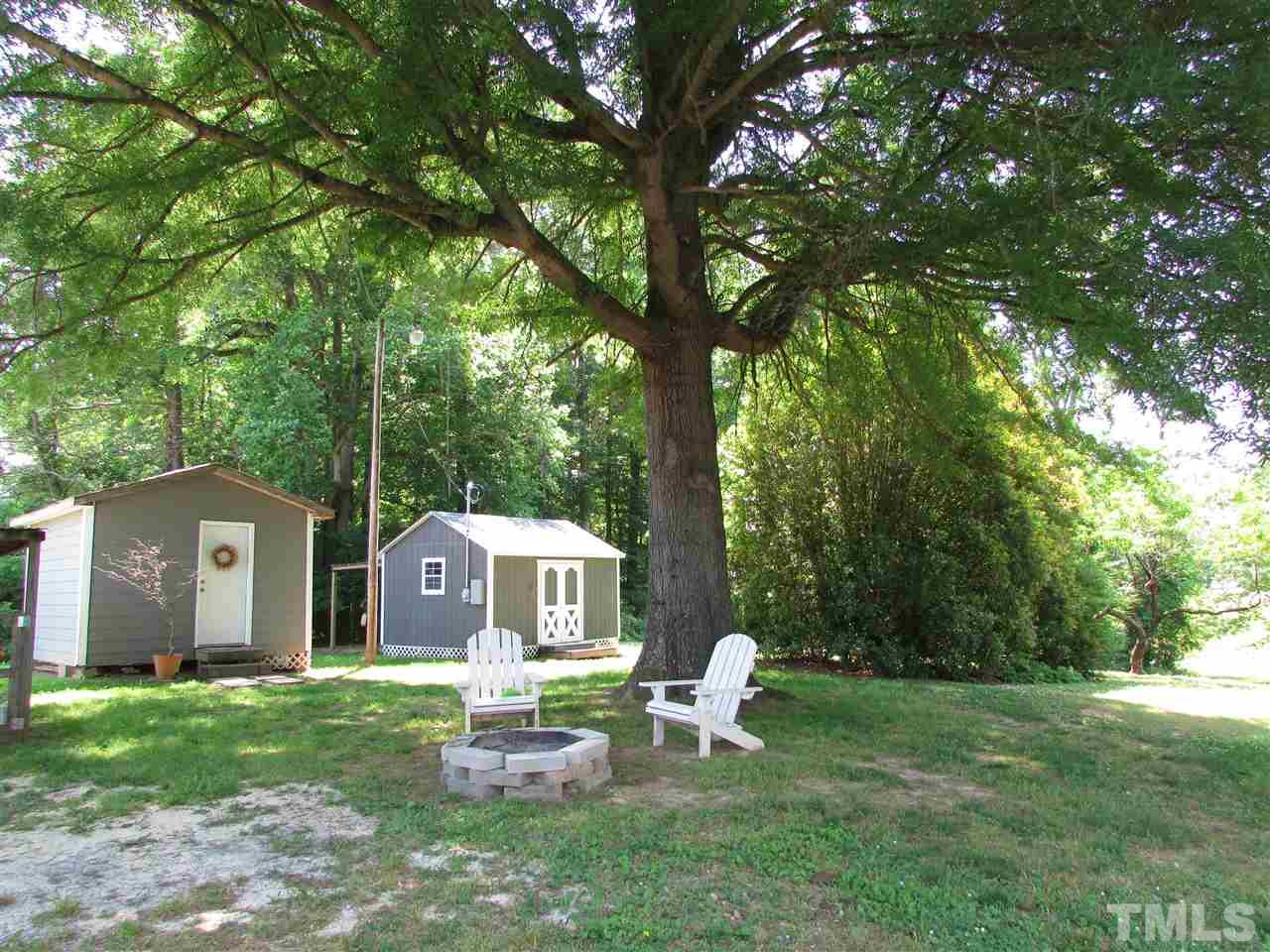 1231 Chambers Loop Road Timberlake, NC 27583 - Photo 17 of 22 What a great place to have a family gathering under the big shade tree.