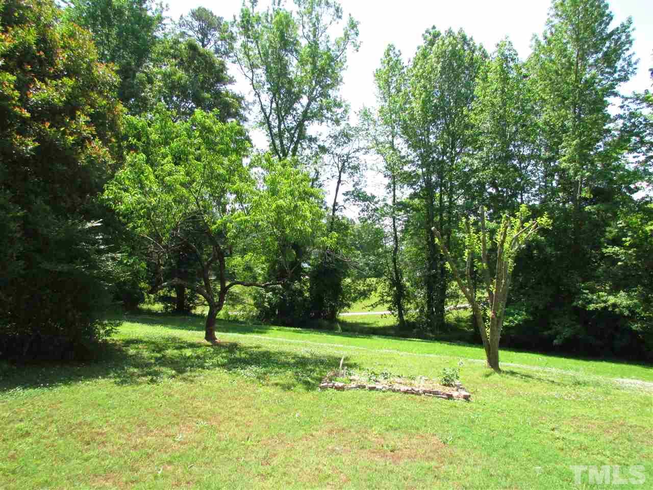 1231 Chambers Loop Road Timberlake, NC 27583 - Photo 20 of 22 Nice lot with shade trees and couple of fruit trees