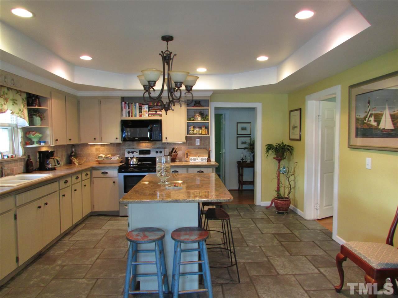 1231 Chambers Loop Road Timberlake, NC 27583 - Photo 6 of 22 Any cook would enjoy cooking and entertaining in this kitchen.