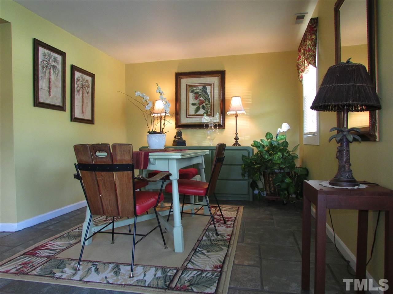 1231 Chambers Loop Road Timberlake, NC 27583 - Photo 9 of 22 Step into the dining area through the garden door into this sweet home with great decor
