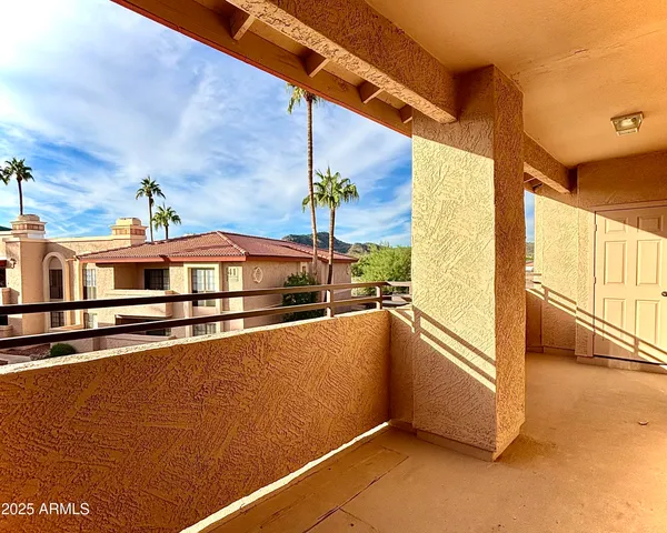 a view of a living room with a large window