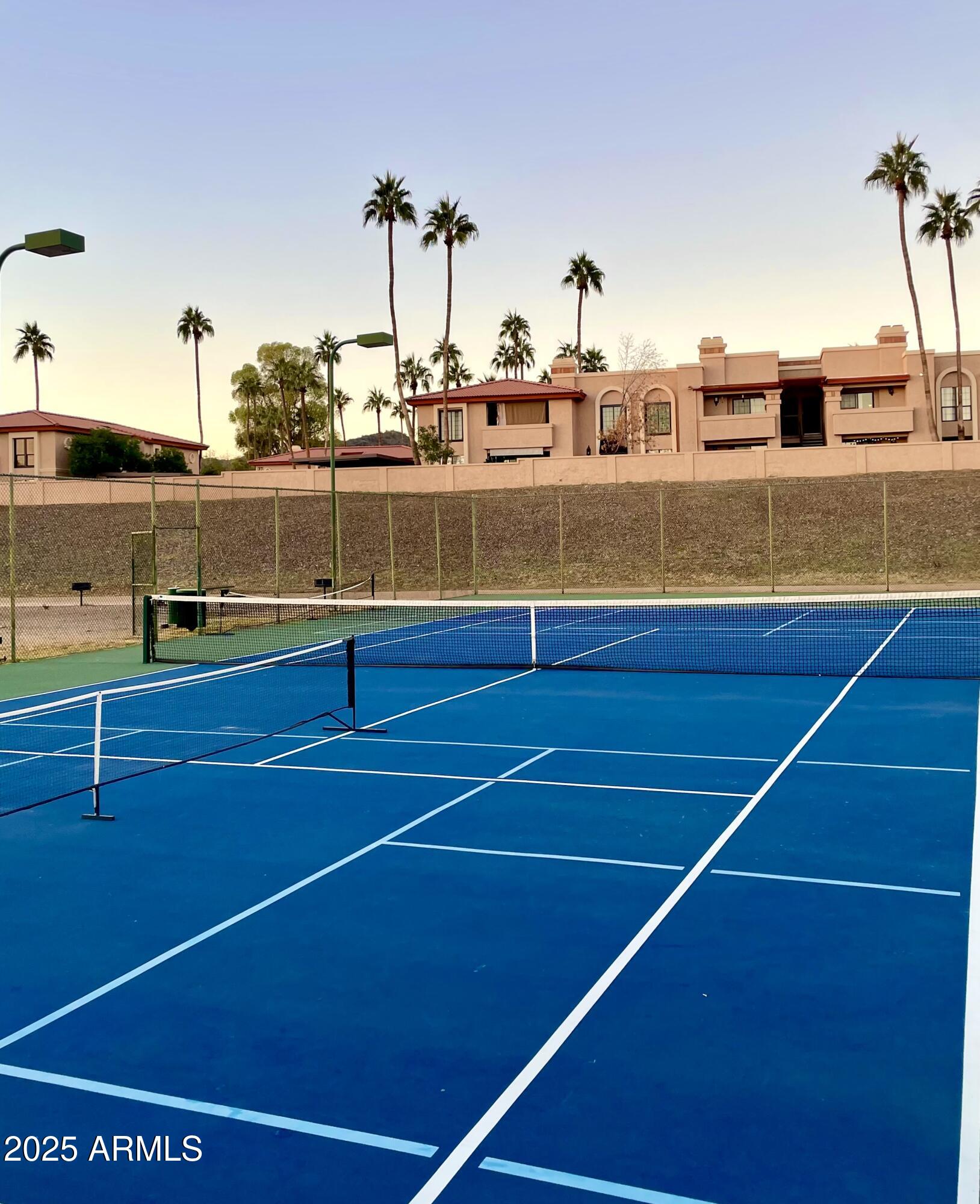 10410 North Cave Creek Road, Unit 2005 Phoenix, AZ 85020 - Photo 19 of 22 a view of a tennis court
