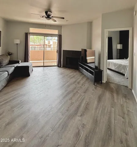 a living room with furniture and a window