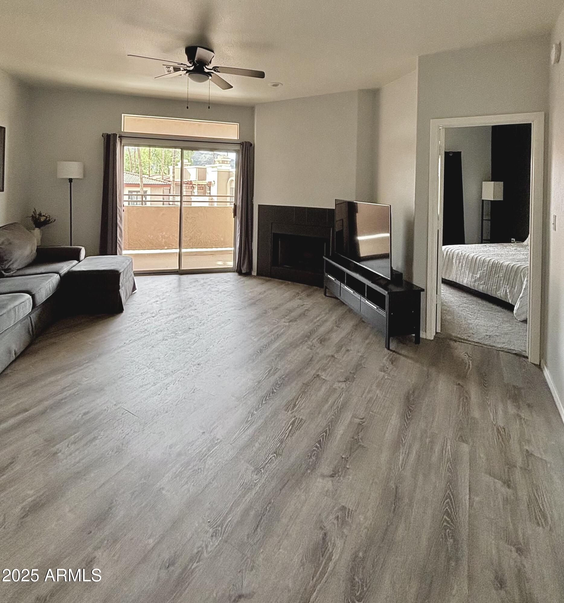 10410 North Cave Creek Road, Unit 2005 Phoenix, AZ 85020 - Photo 4 of 22 a living room with furniture and a window
