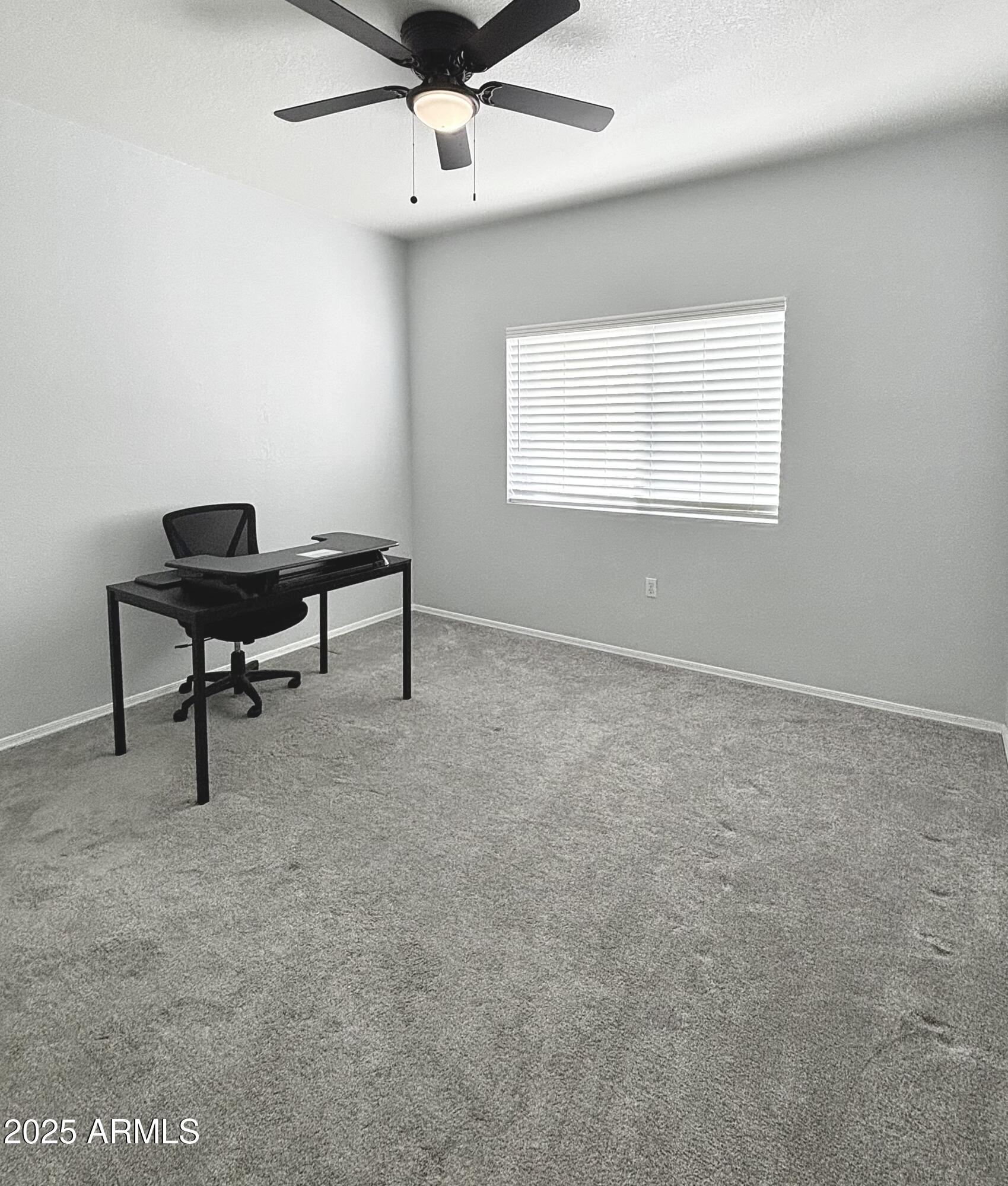 10410 North Cave Creek Road, Unit 2005 Phoenix, AZ 85020 - Photo 8 of 22 a living room with furniture and a window