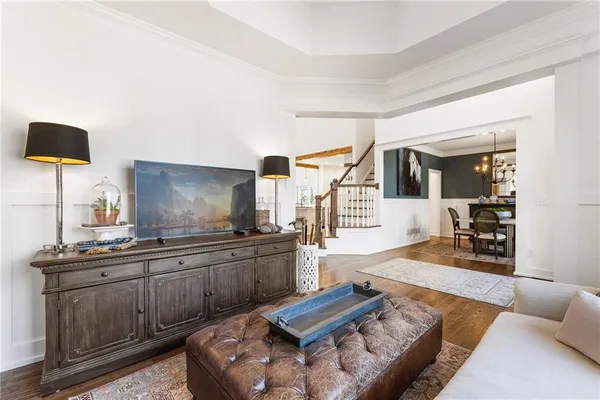 a view of a dining room with furniture and window
