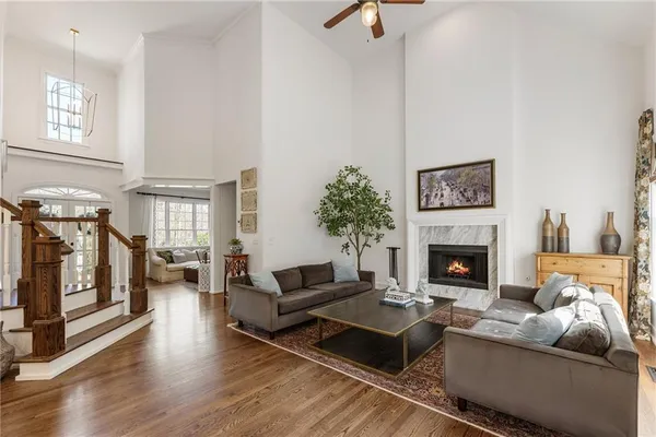 a view of a kitchen with dining table and chairs