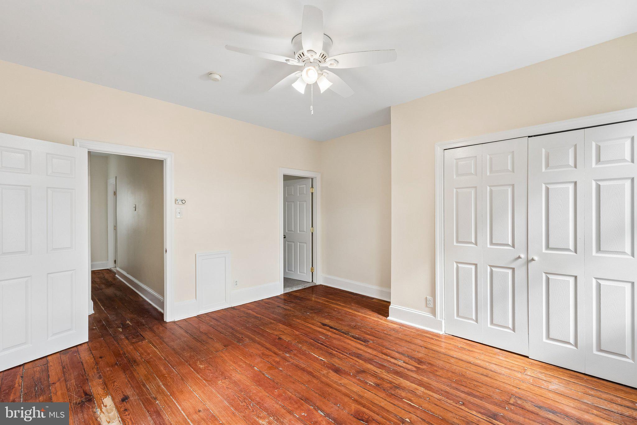 714 South 18th Street Philadelphia, PA 19146 - Photo 15 of 28 a view of an empty room with wooden floor