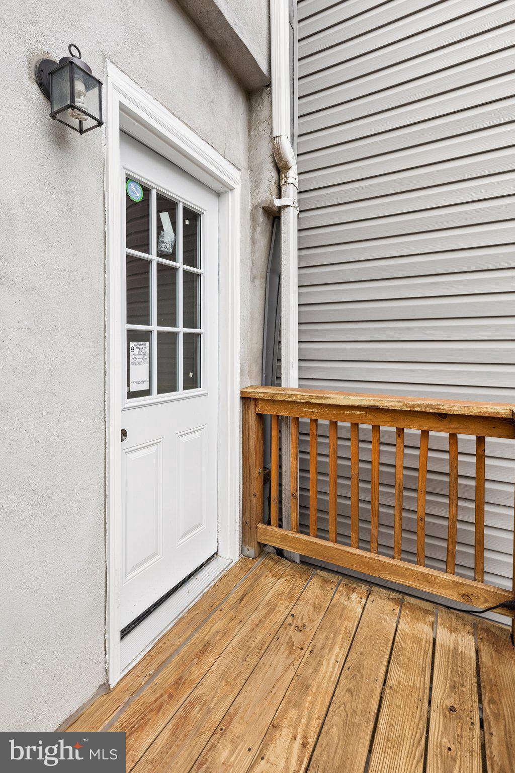 714 South 18th Street Philadelphia, PA 19146 - Photo 18 of 28 a view of a porch with wooden floor