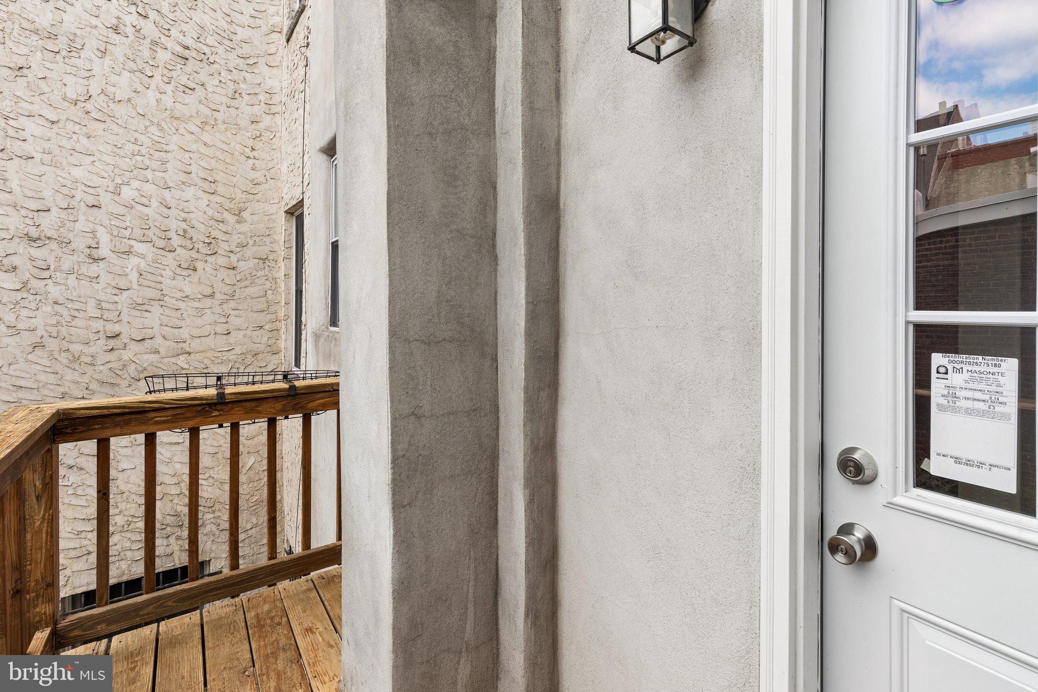 714 South 18th Street Philadelphia, PA 19146 - Photo 19 of 28 a view of a balcony with wooden floor