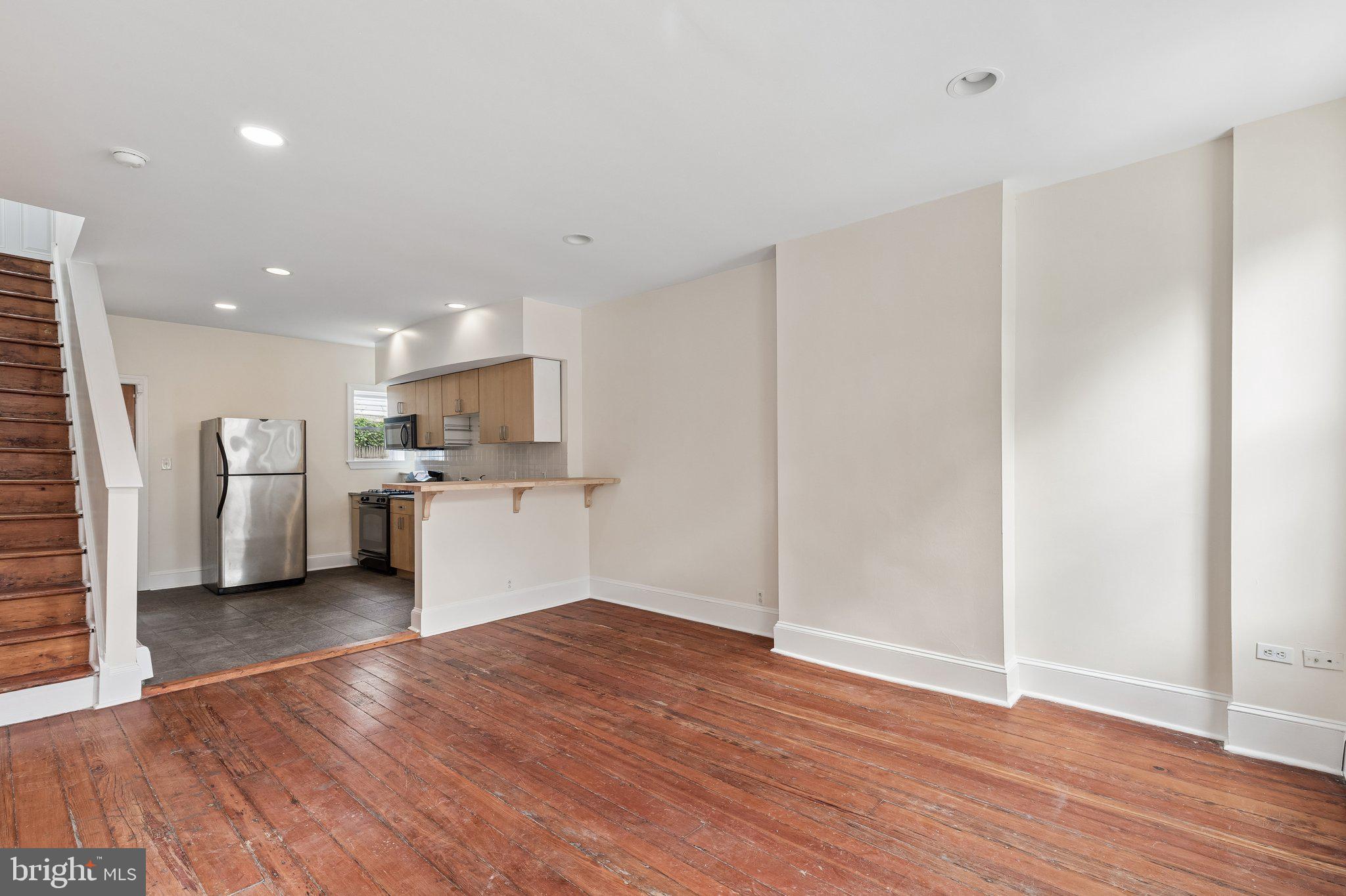 714 South 18th Street Philadelphia, PA 19146 - Photo 7 of 28 a view of kitchen with wooden floor
