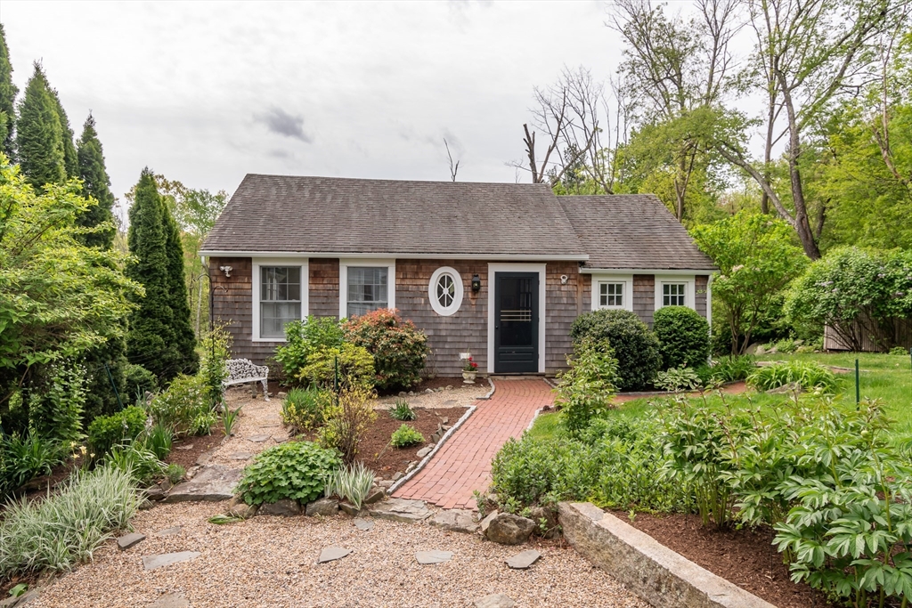 97 Maple Street Sherborn, MA 01770 - Photo 18 of 25 a front view of a house with a yard