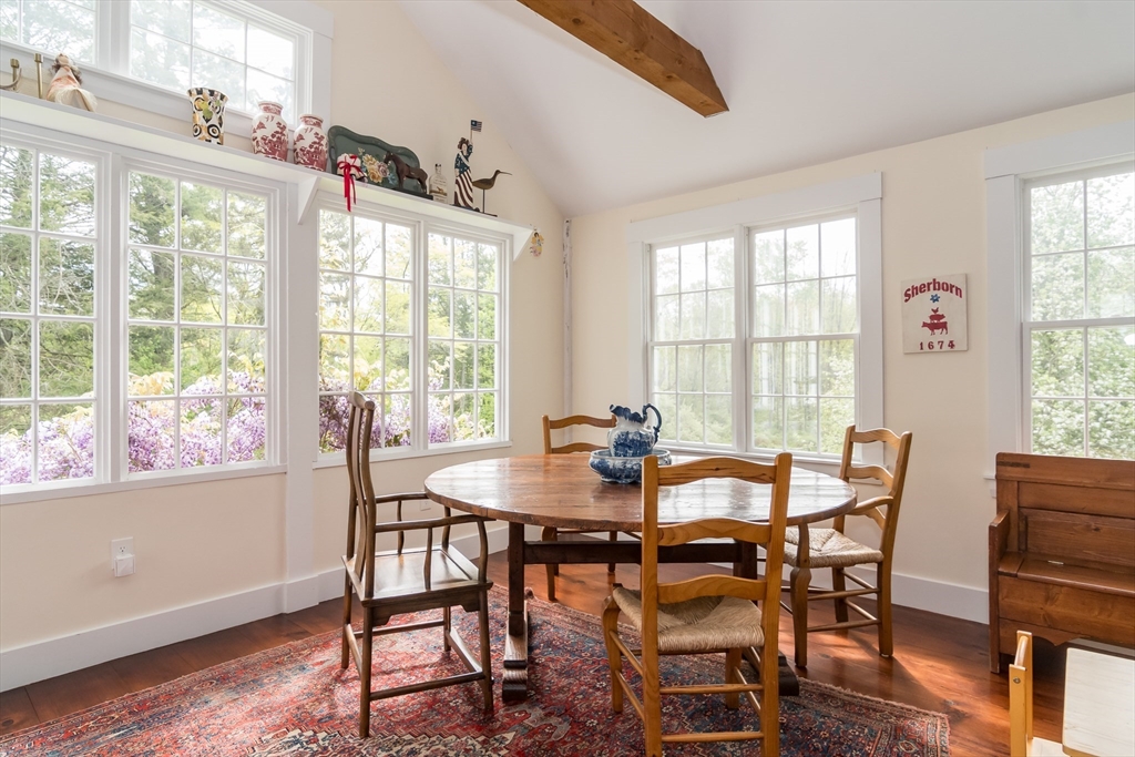 97 Maple Street Sherborn, MA 01770 - Photo 20 of 25 a view of a dining room with furniture and wooden floor