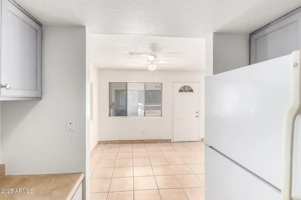 a kitchen with a sink cabinets and stainless steel appliances