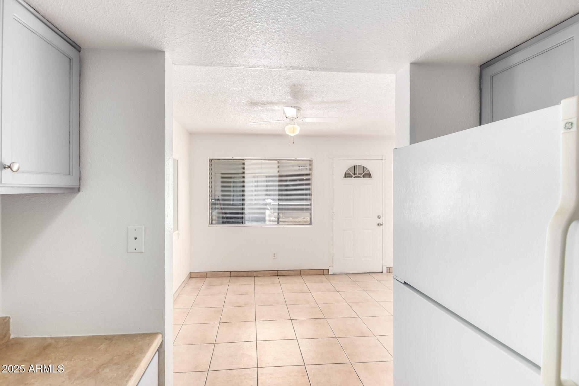 2674 North 43rd Avenue, Unit D Phoenix, AZ 85009 - Photo 7 of 19 a view of an empty room with a window