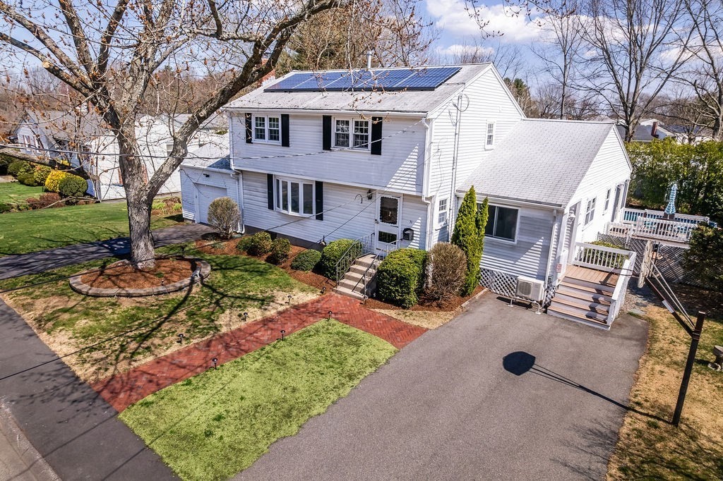 71 Pond Lane Randolph, MA 02368 - Photo 32 of 35 a front view of a house with garden