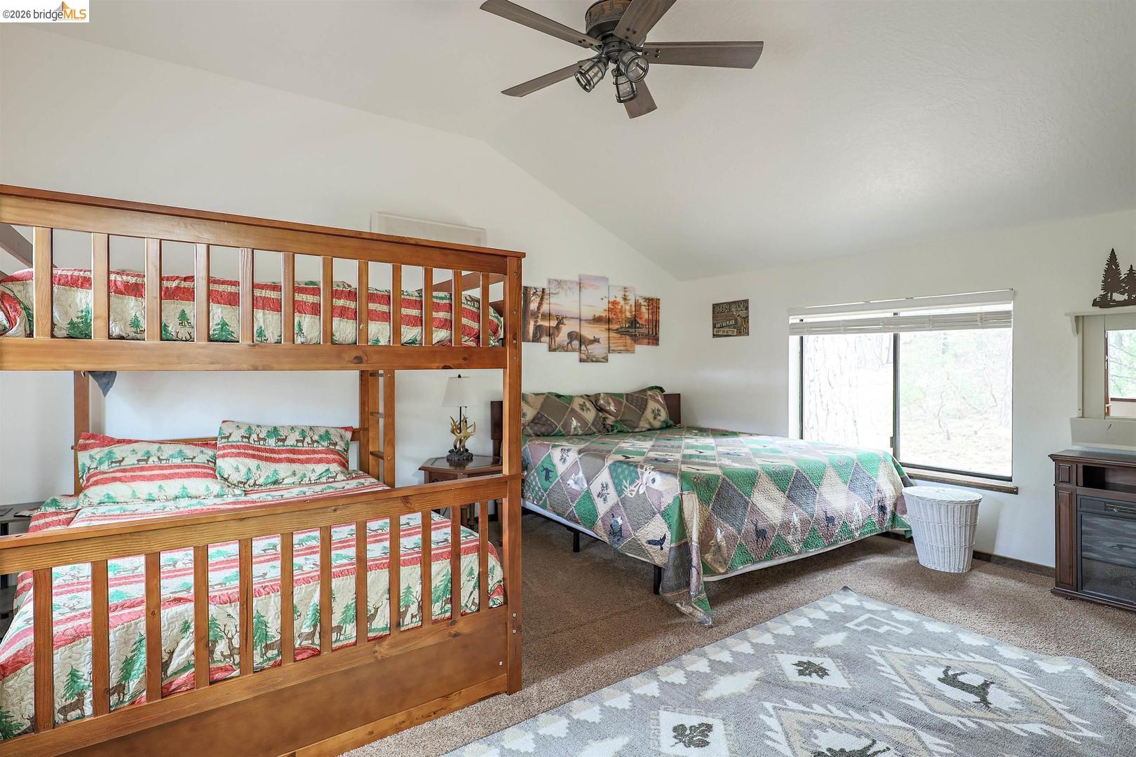 26600 Inyo Drive Cold Springs, CA 95335 - Photo 30 of 38 a bedroom with a bed and a window