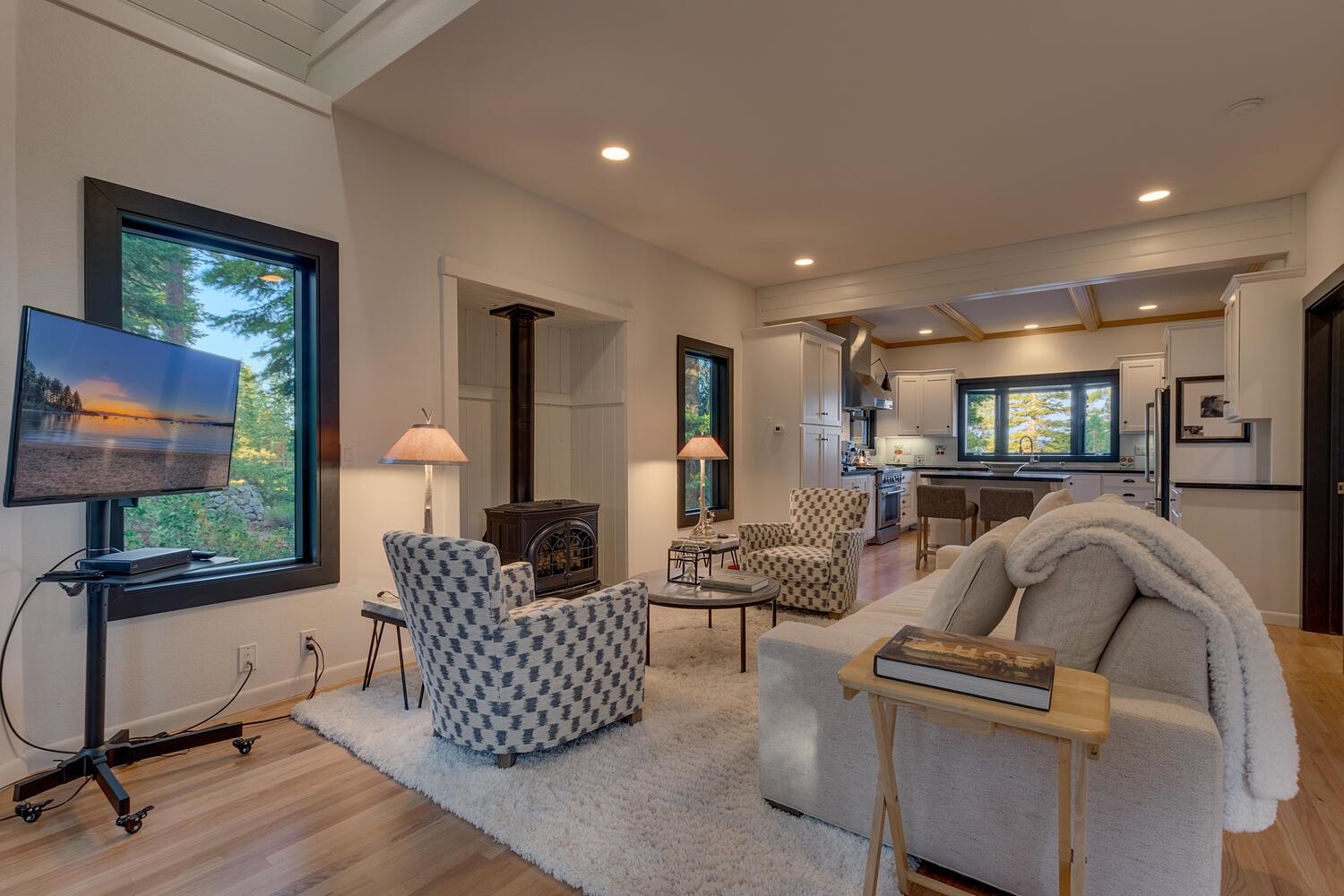 260 Old County Road Carnelian Bay, CA 96140 - Photo 12 of 28 a living room with furniture and a flat screen tv