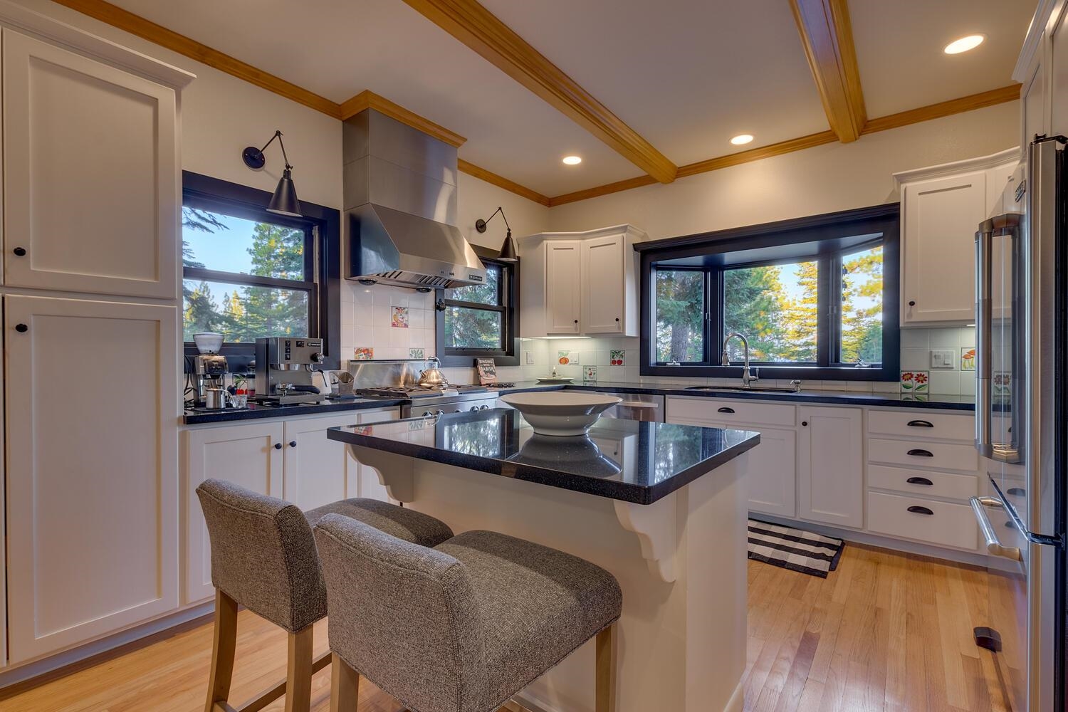 260 Old County Road Carnelian Bay, CA 96140 - Photo 14 of 28 a kitchen with counter top space and windows