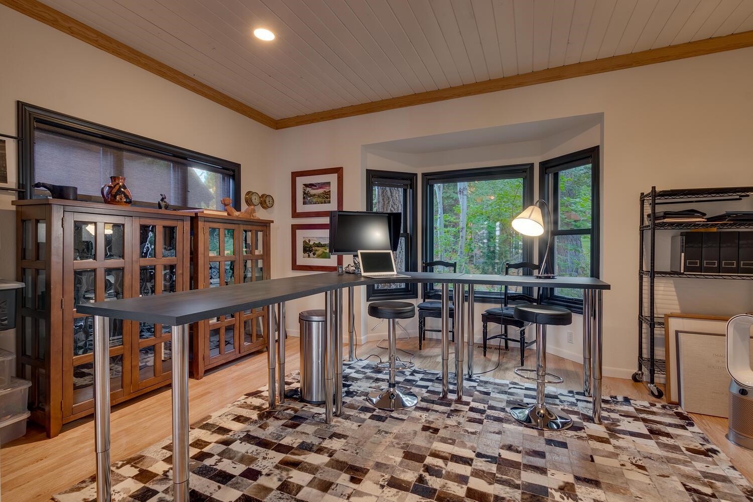 260 Old County Road Carnelian Bay, CA 96140 - Photo 17 of 28 a living room with lots of furniture and a wooden floor