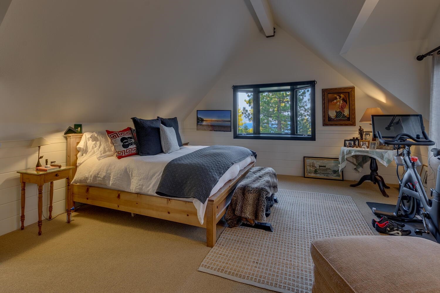 260 Old County Road Carnelian Bay, CA 96140 - Photo 23 of 28 a bed room with a bed and a chair