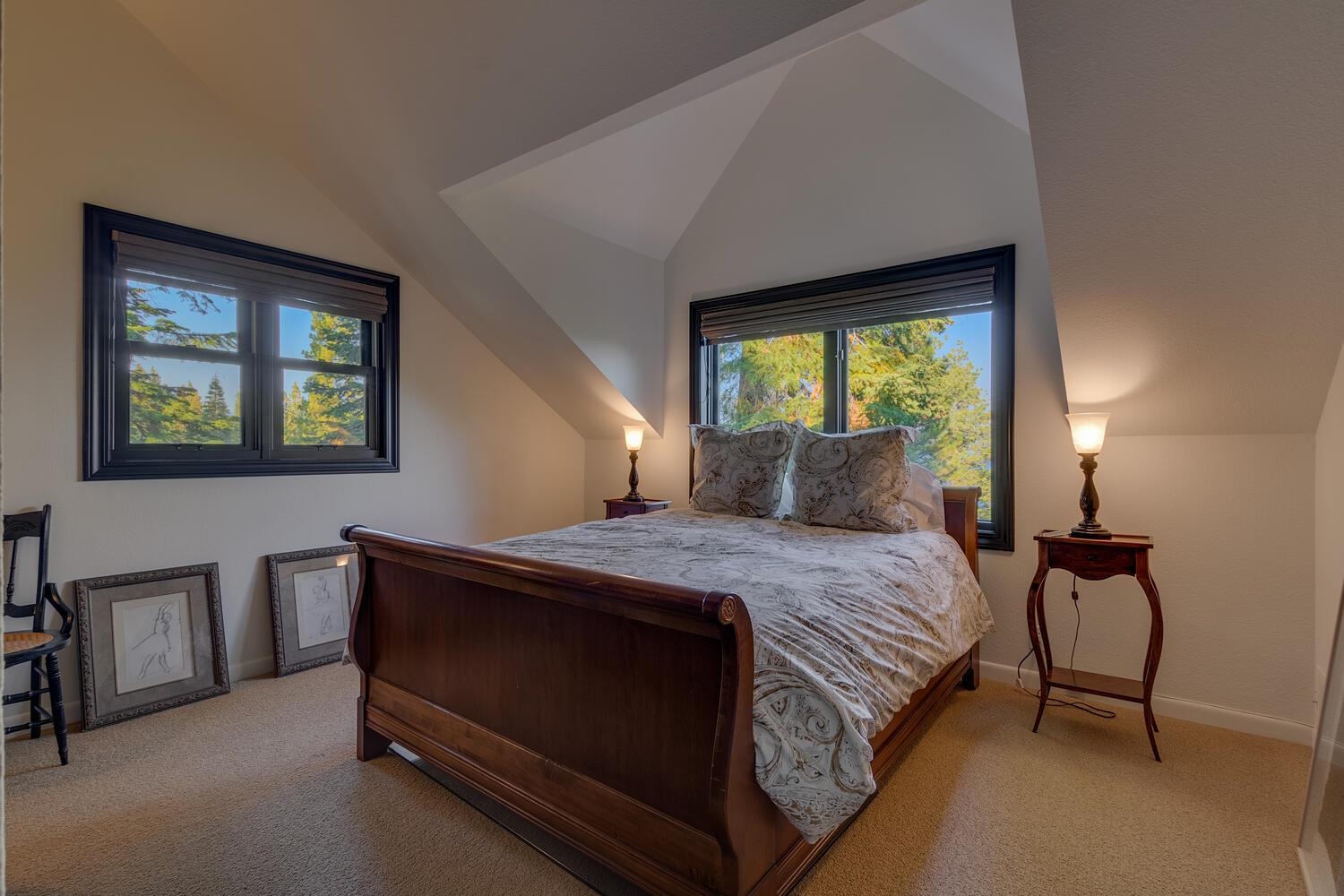 260 Old County Road Carnelian Bay, CA 96140 - Photo 25 of 28 a bed sitting in a bedroom next to a window