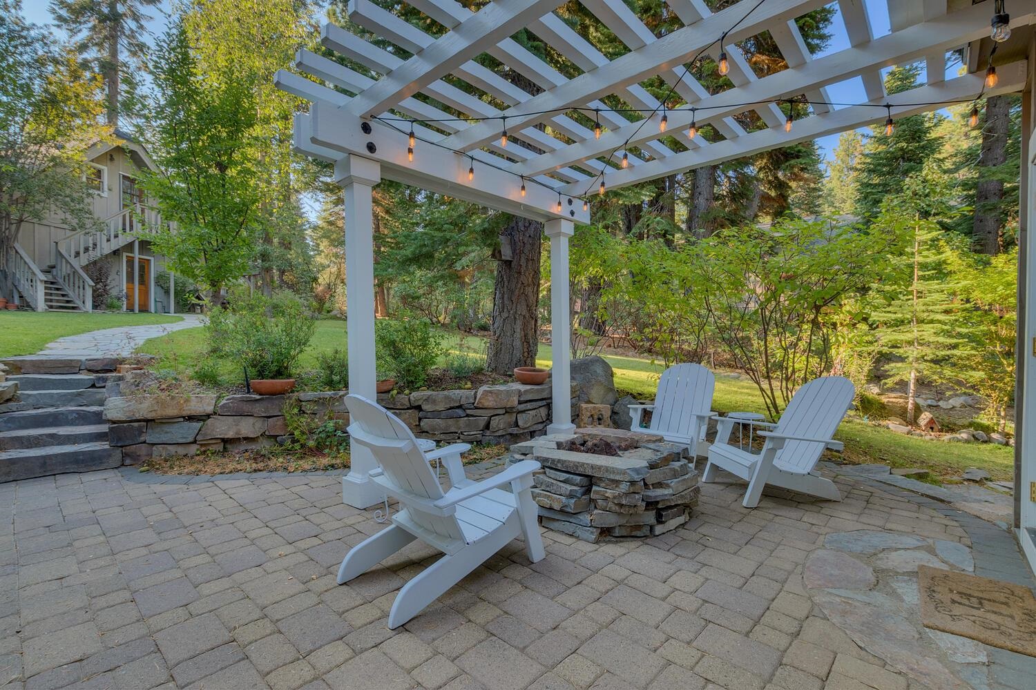 260 Old County Road Carnelian Bay, CA 96140 - Photo 5 of 28 a building outdoor space with patio furniture and potted plants