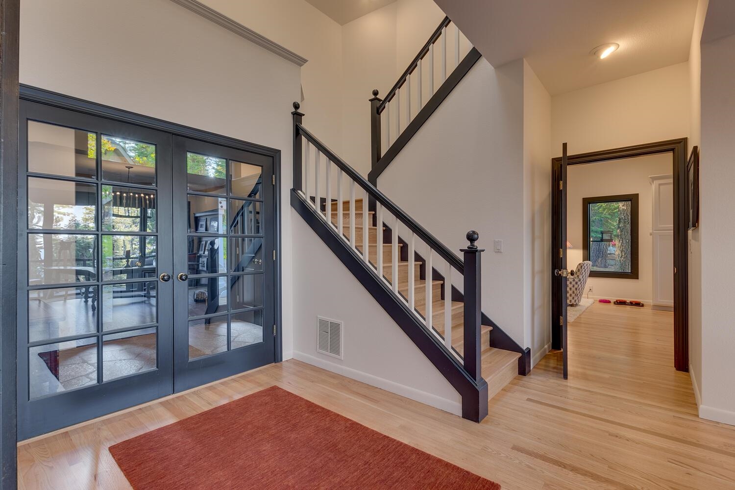 260 Old County Road Carnelian Bay, CA 96140 - Photo 7 of 28 a view of an entryway with wooden floor and windows