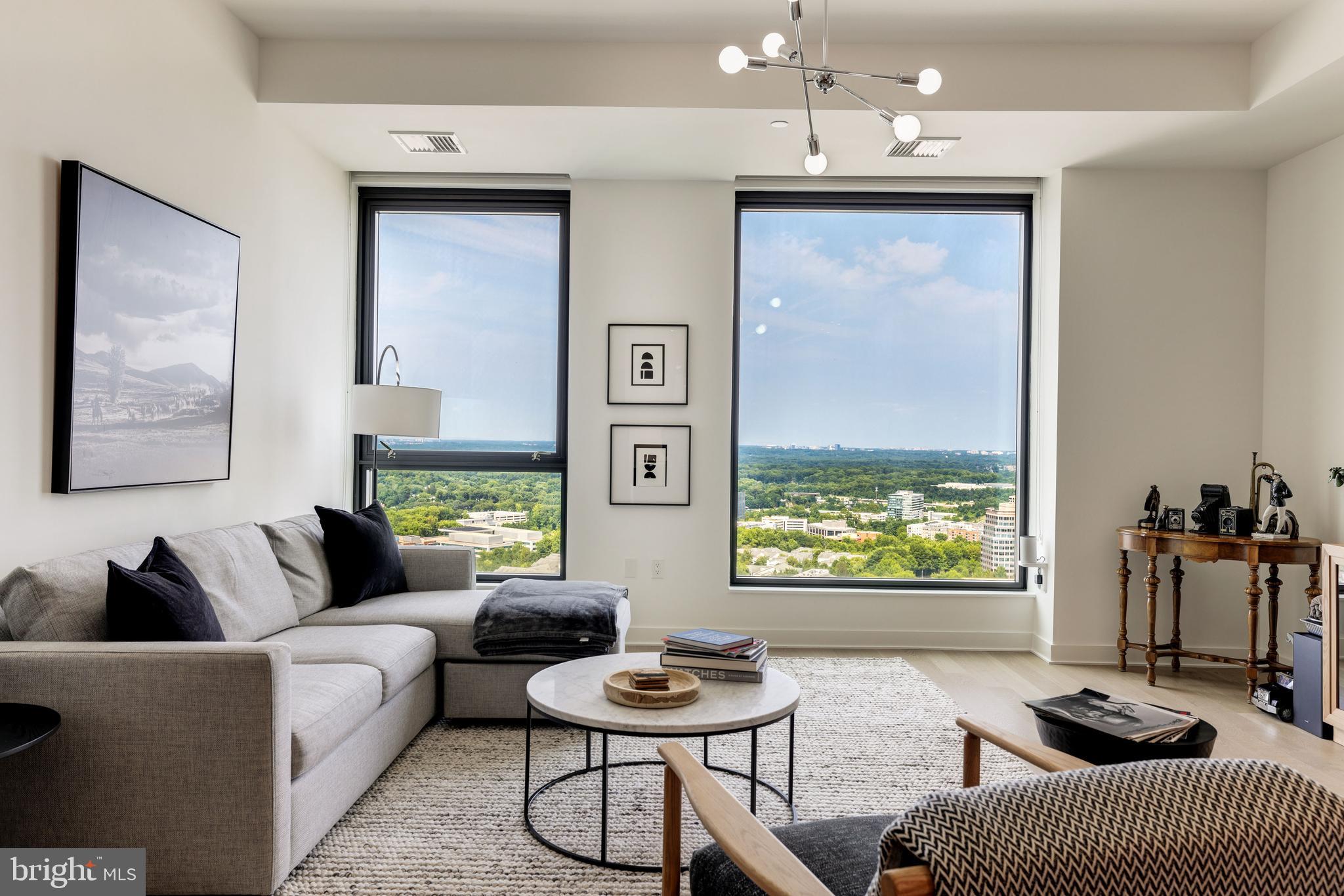 1650 Silver Hill Drive, Unit 23091 McLean, VA 22102 - Photo 3 of 86 a living room with furniture and a window