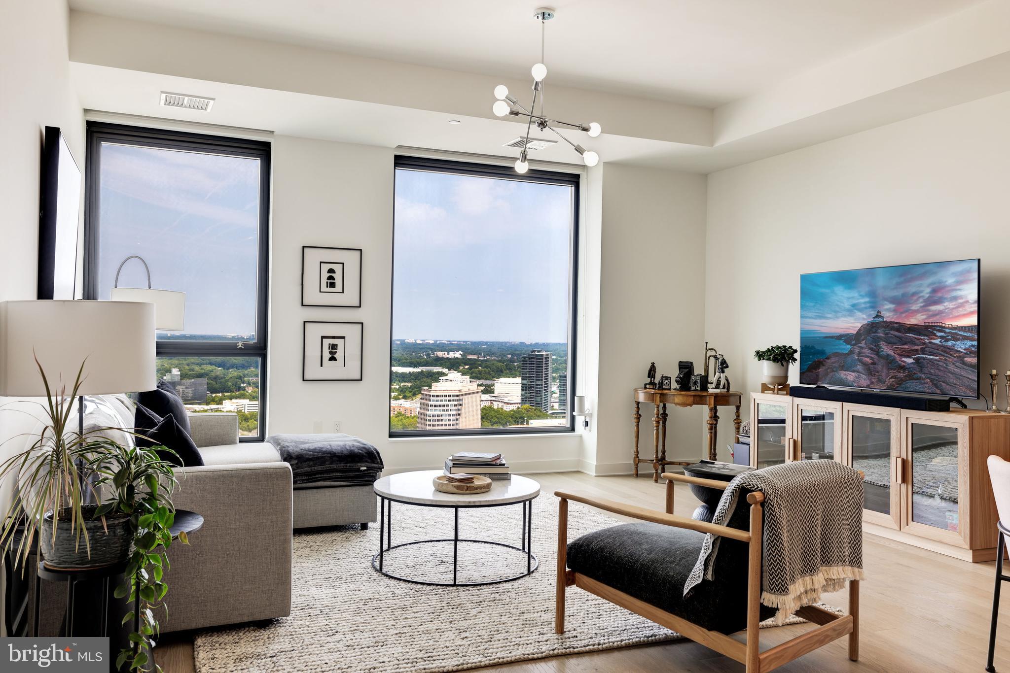 1650 Silver Hill Drive, Unit 23091 McLean, VA 22102 - Photo 4 of 86 a living room with furniture and a large window