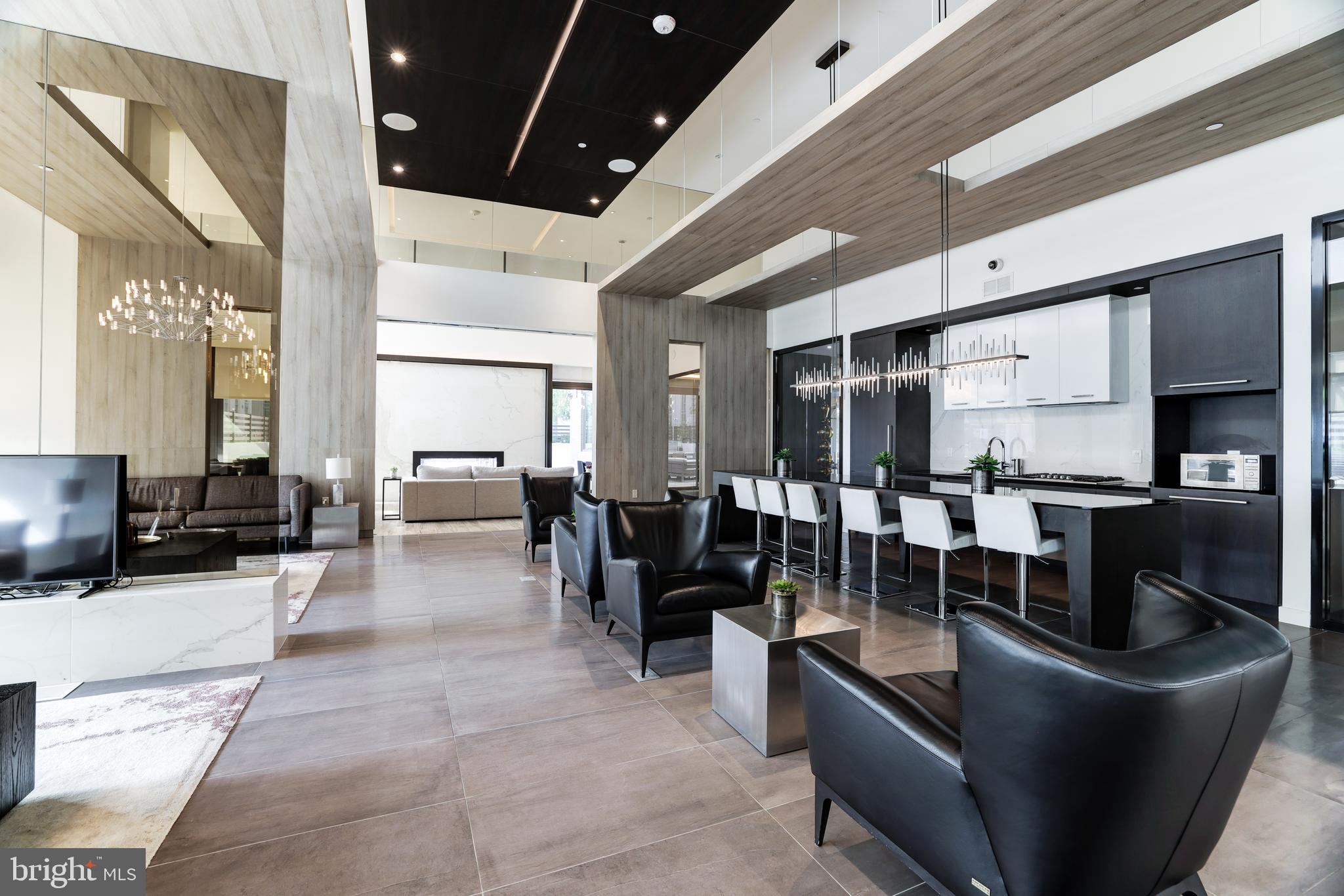 1650 Silver Hill Drive, Unit 23091 McLean, VA 22102 - Photo 72 of 86 a living room with furniture a large window and stainless steel appliances