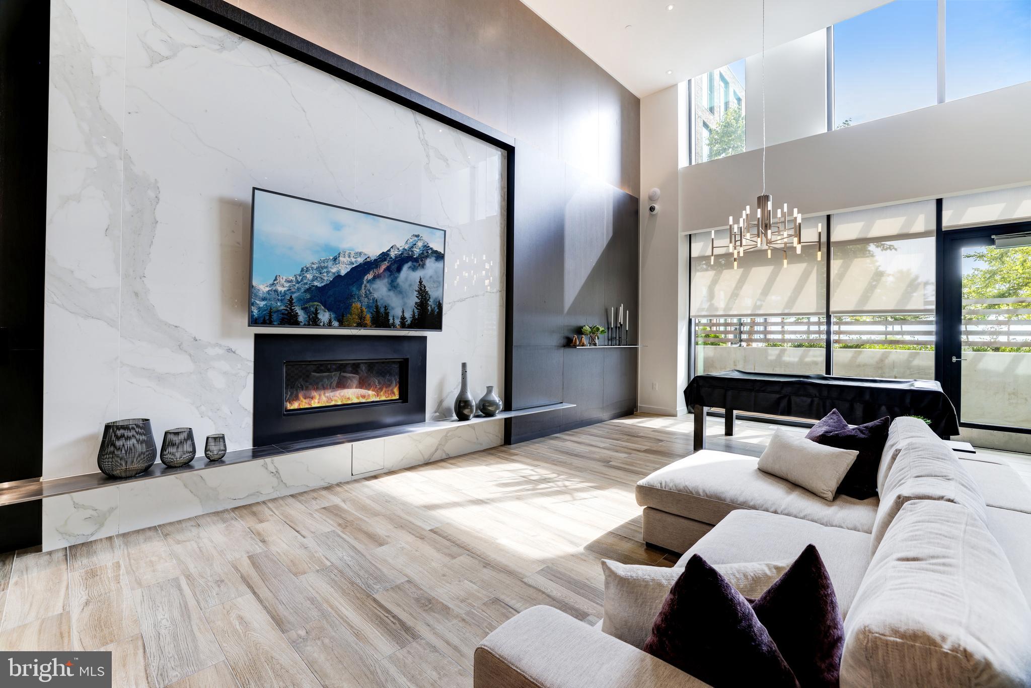 1650 Silver Hill Drive, Unit 23091 McLean, VA 22102 - Photo 73 of 86 a bed room with a bed and a fireplace