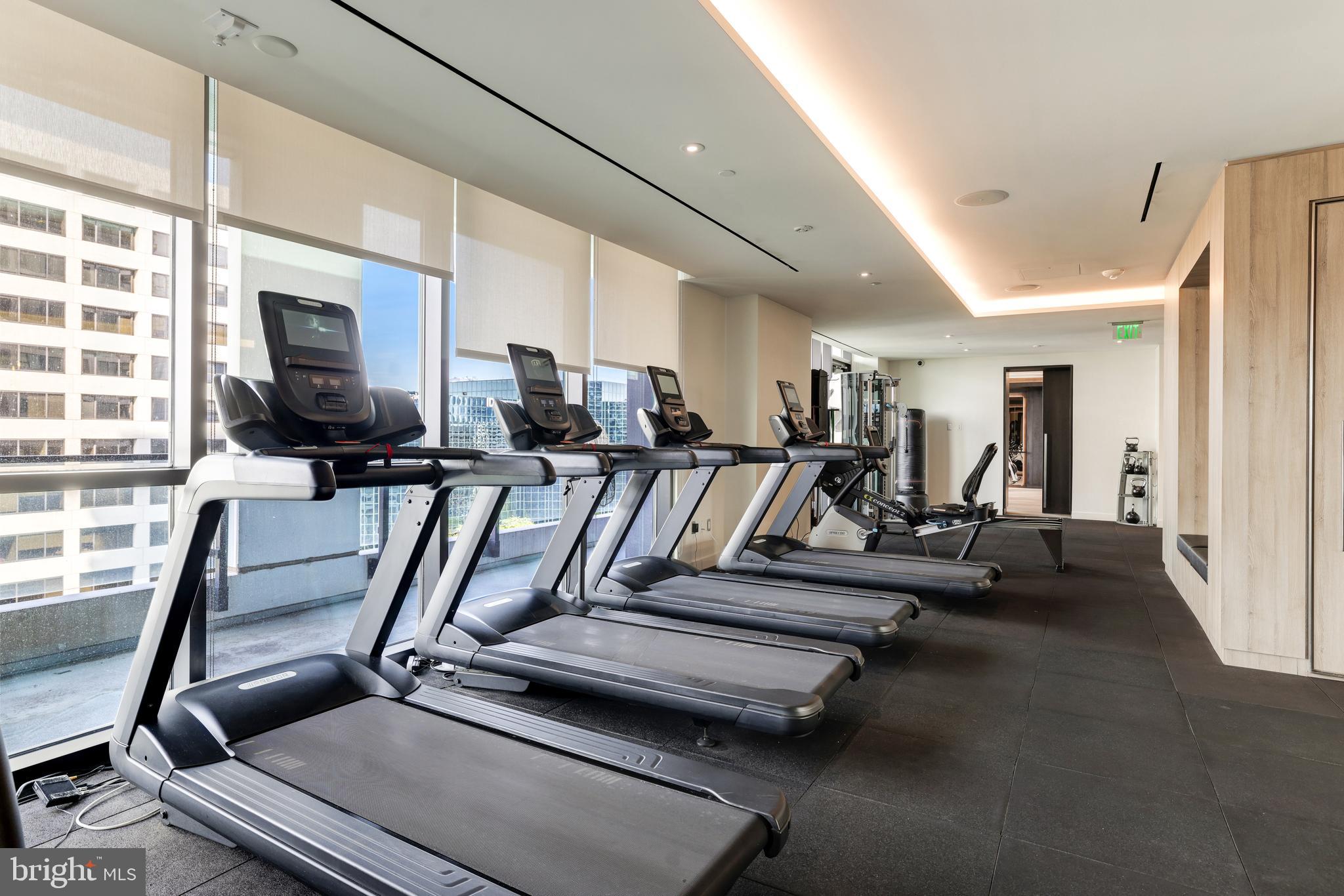 1650 Silver Hill Drive, Unit 23091 McLean, VA 22102 - Photo 76 of 86 a view of a room with gym equipment